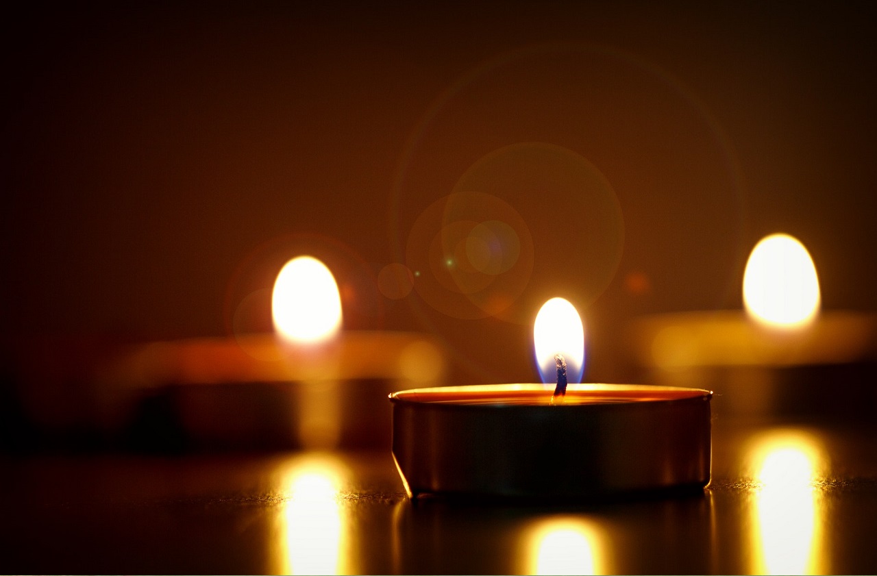 Three small candles burning